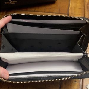 Brand new black Kate Spade medium handbag with shoulder strap and wallet.
